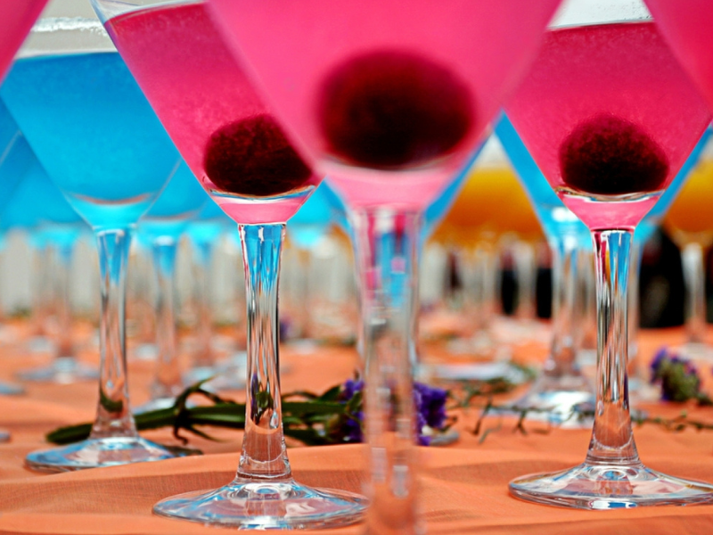 Pink and blue cocktails at a First Time Swingers party